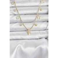 Pirinç Gold Renk Zirkon Taşlı Kutup Yıldızı Model Kadın Kolye