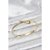 Pirinç Gold Renk Zirkon Taşlı Fiyonk Model Kadın Kelepçe Bileklik