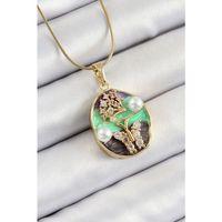 316L Çelik Zincir Zirkon Taşlı Yeşil Mor Sanatsal Portre İnci Detaylı Ağaç Ve Kelebek Figürlü Model Gold Renk Kadın Kolye