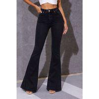 Kadın Yüksek Bel Tek Düğmeli Paçaya Doğru Genişleyen Kot Pantolon