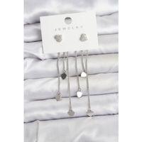 Kalp Model Gümüş Renk Pirinç Sallantılı Kadın Küpe