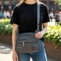 Fiyra ç2 Gri Beş Gözlü Krinkıl Kumaş Bayan Çapraz Omuz Çanta