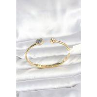 Pirinç Gold Renk Kalpli Model Kadın Kelepçe Bileklik