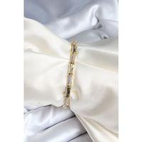 Pirinç Kemik Model Zirkon Taşlı Gold Renk Kadın Bileklik