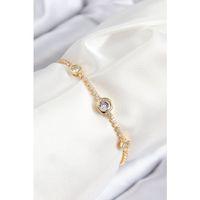 Pirinç Zirkon Taşlı Daire Model Gold Renk Asansörlü Kadın Bileklik