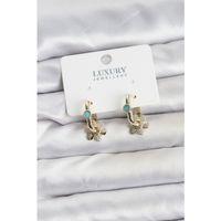 Mavi Taş Detaylı Pirinç Gold Renk Kadın Göçmen Küpesi