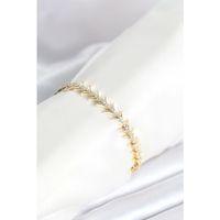 Pirinç Gold Renk Balık Sırtı Model Zirkon Taşlı Kadın Bileklik