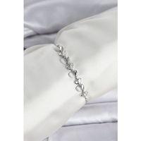 Gümüş Renk Zirkon Taşlı Sıralı Damla Model Asansörlü Kadın Bileklik