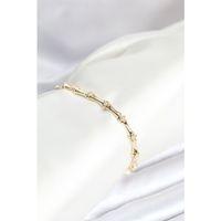 Pirinç Gold Renk Kemik Model Zirkon Taşlı Kadın Bileklik
