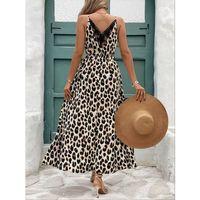 Kadın Ip Askılı Yuvarlak Yakalı Arkası V Yakalı Yırtmaçlı Uzun Leopar Desenli Süprem Elbise