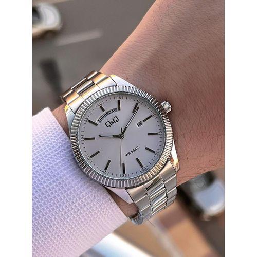 Q&Q Çelik Kordon Takvimli Kadran 2 Yıl Garantili 3 Atm Suya Dayanıklı Erkek Kol Saati QQ.E2005.A1
