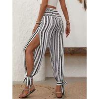 Kadın Yüksek Bel Desenli Paçadan Bağlamalı Yanları Yırtmaçlı Süprem Pantolon