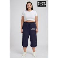 Kadın Büyük Beden Unified Collective Baskılı Beli Lastikli Bol Paça Kapri Şort 3XL-6XL SPR26BSRK591-10