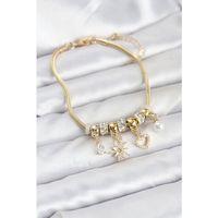 Pirinç Gold Renk Kutup Yıldızı ve Kalp Charmlı Kadın Bileklik