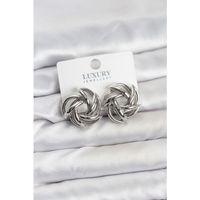 Gümüş Renk Pirinç Keskin Sarmal Model Kadın Küpe