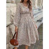 Kadın Uzun Kollu Kruvaze Yaka Beli Lastikli Kiloş Desenli Midi Süprem Elbise