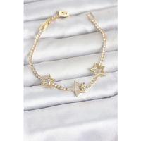 Pirinç Gold Renk Yıldız Model Zirkon Taşlı Su Yolu Kadın Bileklik