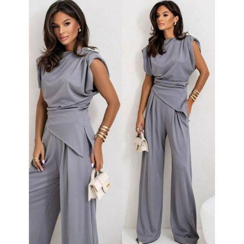 Kadın Dalgıç Kumaş Sıfır Kol Bluz Ve Bol Kesim Pantolon Ikili Takım