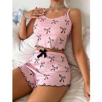 Pembe Üstüne Siyah Kurdela Desenli Askılı Şortlu Pijama Takımı