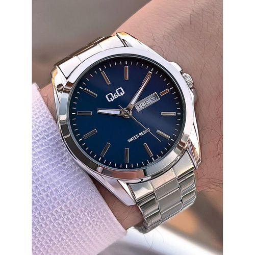 Q&Q Çelik Kordon Takvimli Kadran 2 Yıl Garantili 3 Atm Suya Dayanıklı Erkek Kol Saati QQ.E2001.A2