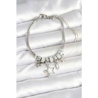 Pirinç Gümüş Renk Yıldız Charmlı Kadın Bileklik