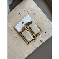 Mineli Kıvrımlı Küpe - Krem