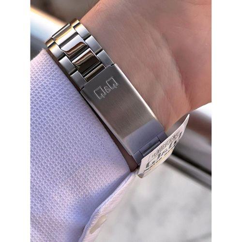 Q&Q Çelik Kordon Takvimli Kadran 2 Yıl Garantili 3 Atm Suya Dayanıklı Erkek Kol Saati QQ.E2004.A1