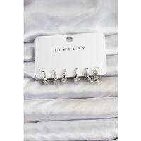 Gümüş Renk Pirinç Yıldız Modelli Kadın Küpe Seti