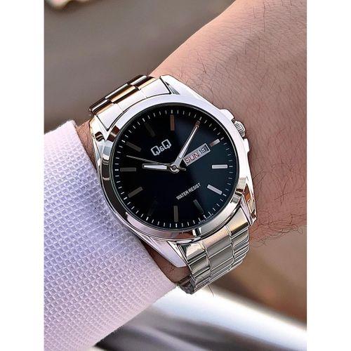 Q&Q Çelik Kordon Takvimli Kadran 2 Yıl Garantili 3 Atm Suya Dayanıklı Erkek Kol Saati QQ.E2001.A3