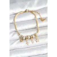 Pirinç Gold Renk Kutup Yıldızı Charmlı Kadın Bileklik