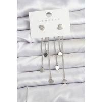 Kalp Model Gümüş Renk Pirinç Sallantılı Kadın Küpe