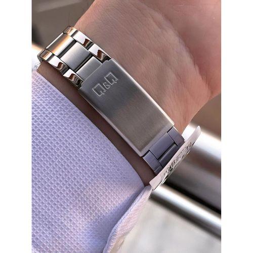 Q&Q Çelik Kordon Takvimli Kadran 2 Yıl Garantili 3 Atm Suya Dayanıklı Erkek Kol Saati QQ.E2001.A1