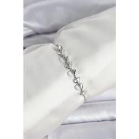 Gümüş Renk Zirkon Taşlı Sıralı Damla Model Asansörlü Kadın Bileklik