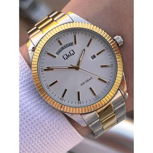 Q&Q Çelik Kordon Takvimli Kadran 2 Yıl Garantili 3 Atm Suya Dayanıklı Erkek Kol Saati QQ.E2005.A2