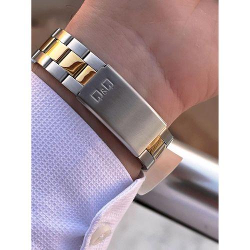 Q&Q Çelik Kordon Takvimli Kadran 2 Yıl Garantili 3 Atm Suya Dayanıklı Erkek Kol Saati QQ.E2005.A2